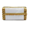 Gold clutch with fringe details on a white background