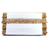 White clutch with gold decorative trim on a white background