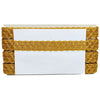 White box with gold woven lid on a white background