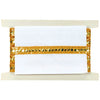 Decorative holder with gold trim and white paper on a white background