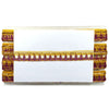 Decorative trim with gold and purple patterns on a white background