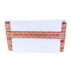 Decorative headband with pink and yellow patterns on a white background