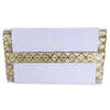 White clutch with gold and yellow pattern on a white background