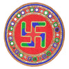 Decorative plate with a multicolored swastika symbol on a red background