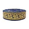 Roll of blue and gold embroidered ribbon on a white background