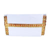 Decorative valance with gold and red pattern on a white background