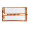 Clutch bag with orange and gold sequin details on a white background