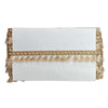 White clutch bag with Pearl Matt tassel detail on a white background