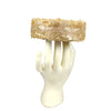 Gold sequin headband on a mannequin head against a white background