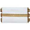 White clutch with gold fringe on a white background