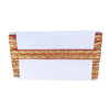 White table runner with red and yellow geometric pattern on a white background