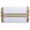 White clutch bag with gold braided trim on a white background