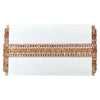 White clutch with gold embellishments on a white background