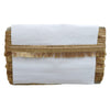 White clutch with gold fringe on a white background