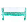 Green headboard with decorative patterns on a white background