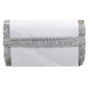White clutch bag with silver glittery trim on a white background