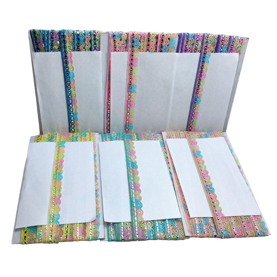 Set of three colorful stationery items with decorative borders on a white background