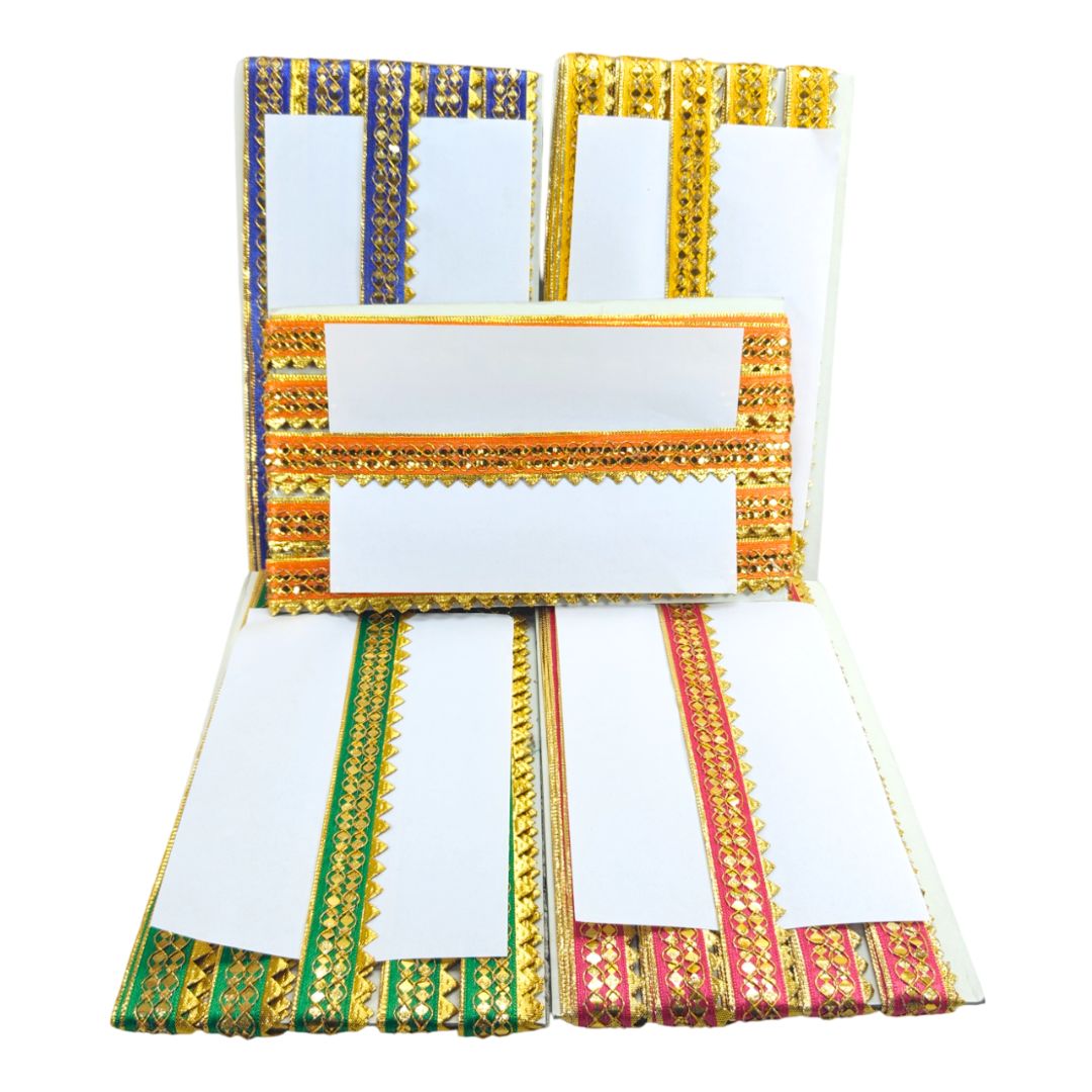 Decorative white napkins with colorful borders on a white background