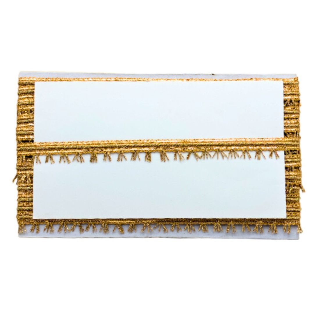 White clutch with gold fringe on a white background