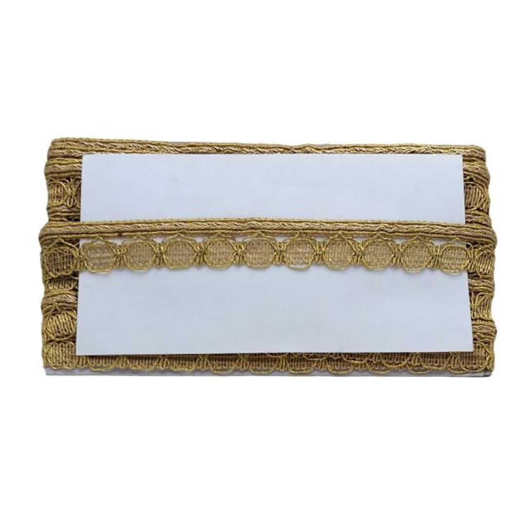 Gold decorative trim with a white center on a white background