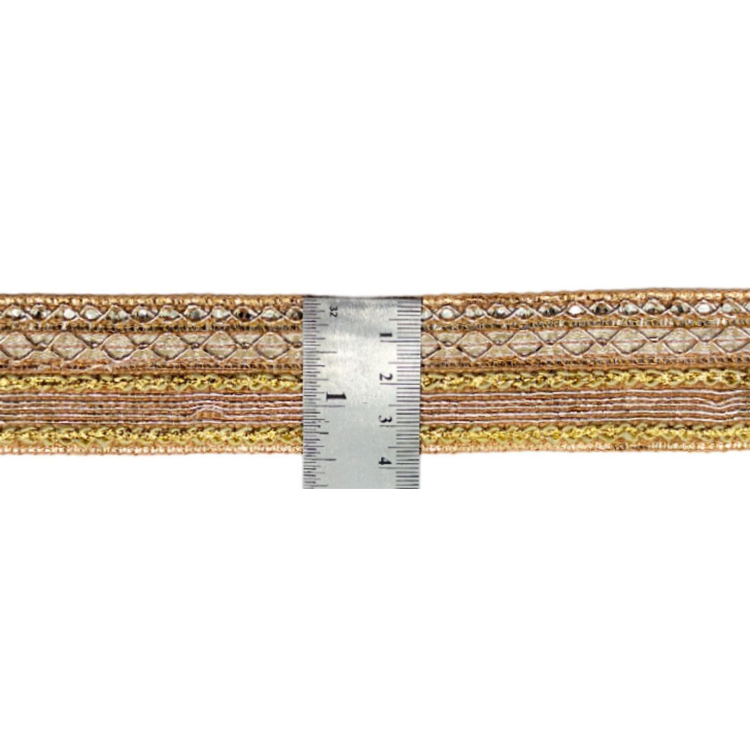 Decorative ribbon with a ruler for scale on a white background