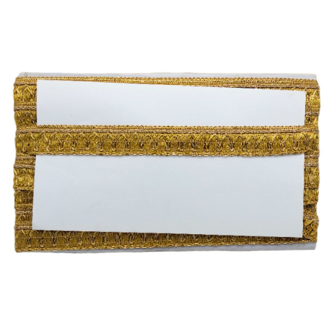 Gold clutch with white interior on a white background