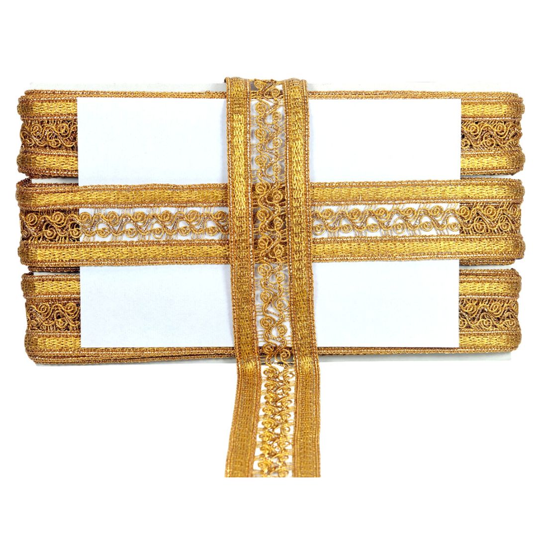 Gold decorative ribbon with intricate patterns on a white background
