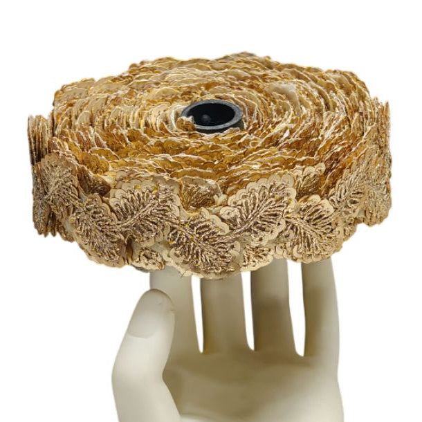 Mannequin hand holding a woven basket on a white background