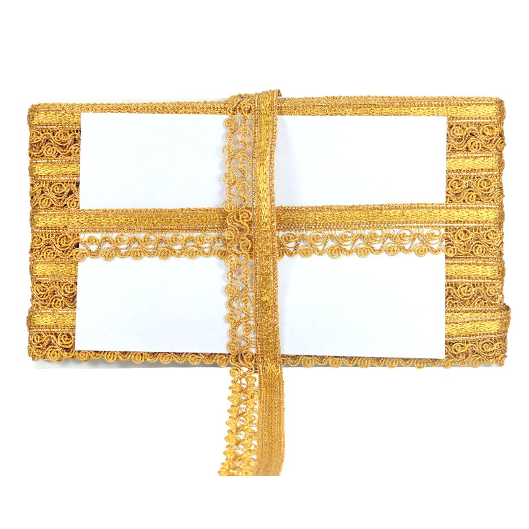Gold lace trim on a white background