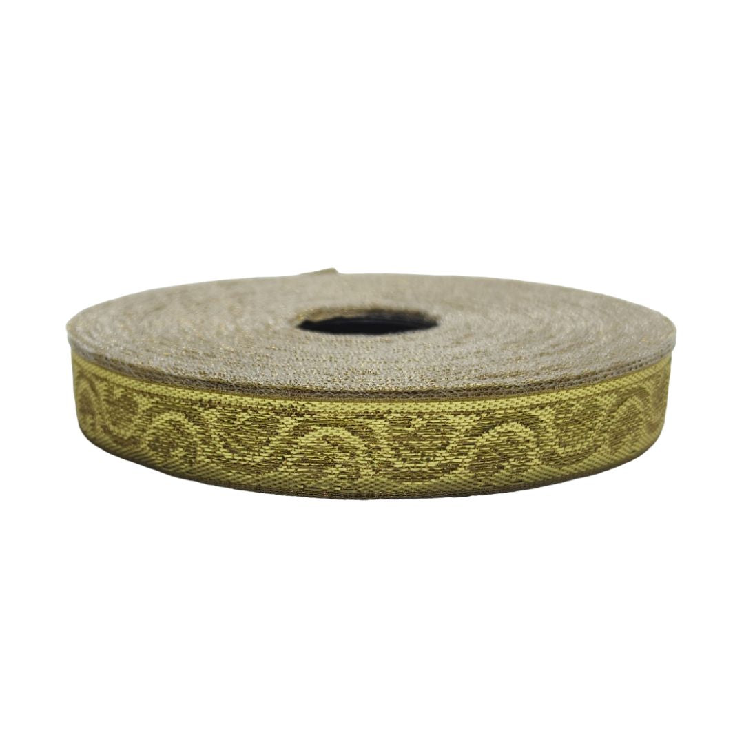Roll of green ribbon with a decorative pattern on a white background