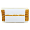 Yellow lace trim on a white card with a white background