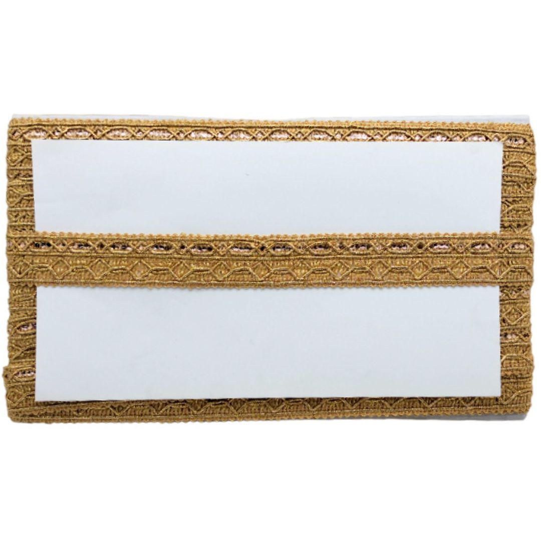 Two white name tags with gold lace trim on a white background