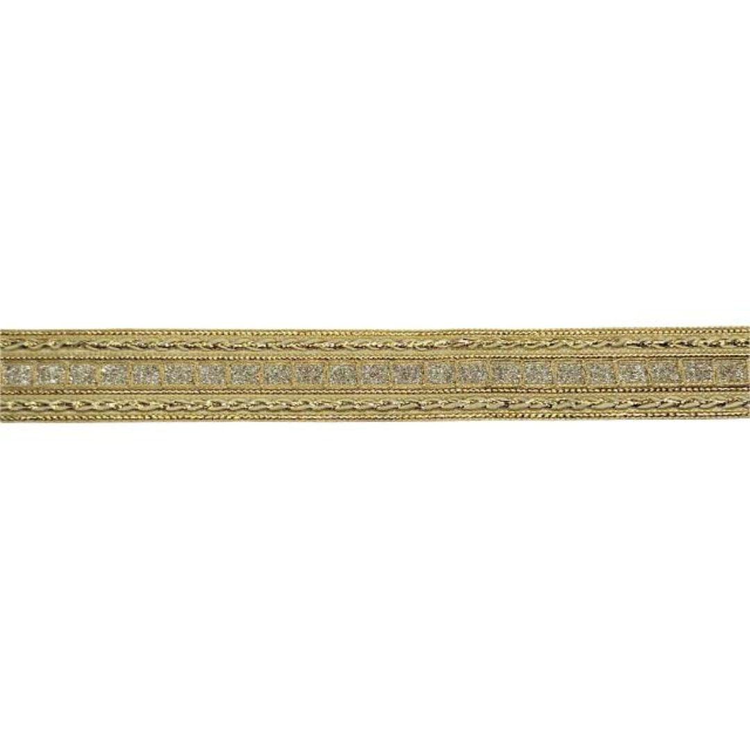 Decorative gold ribbon with intricate patterns on a white background
