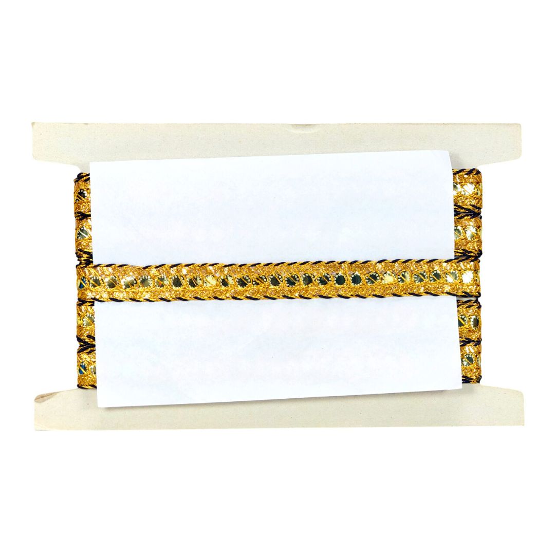 Gold bracelet with black stones on a white background