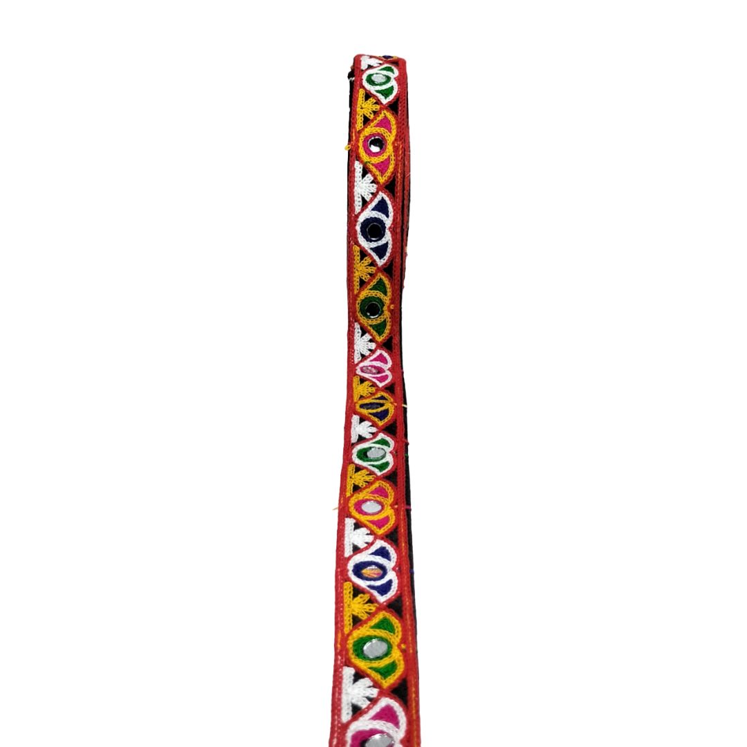 Decorative headband with colorful patterns on a white background