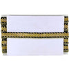 White clutch with gold and black embellishments on a white background