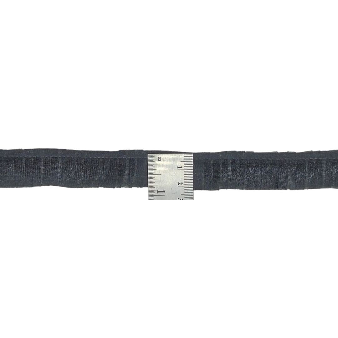 Black belt with a silver buckle on a white background