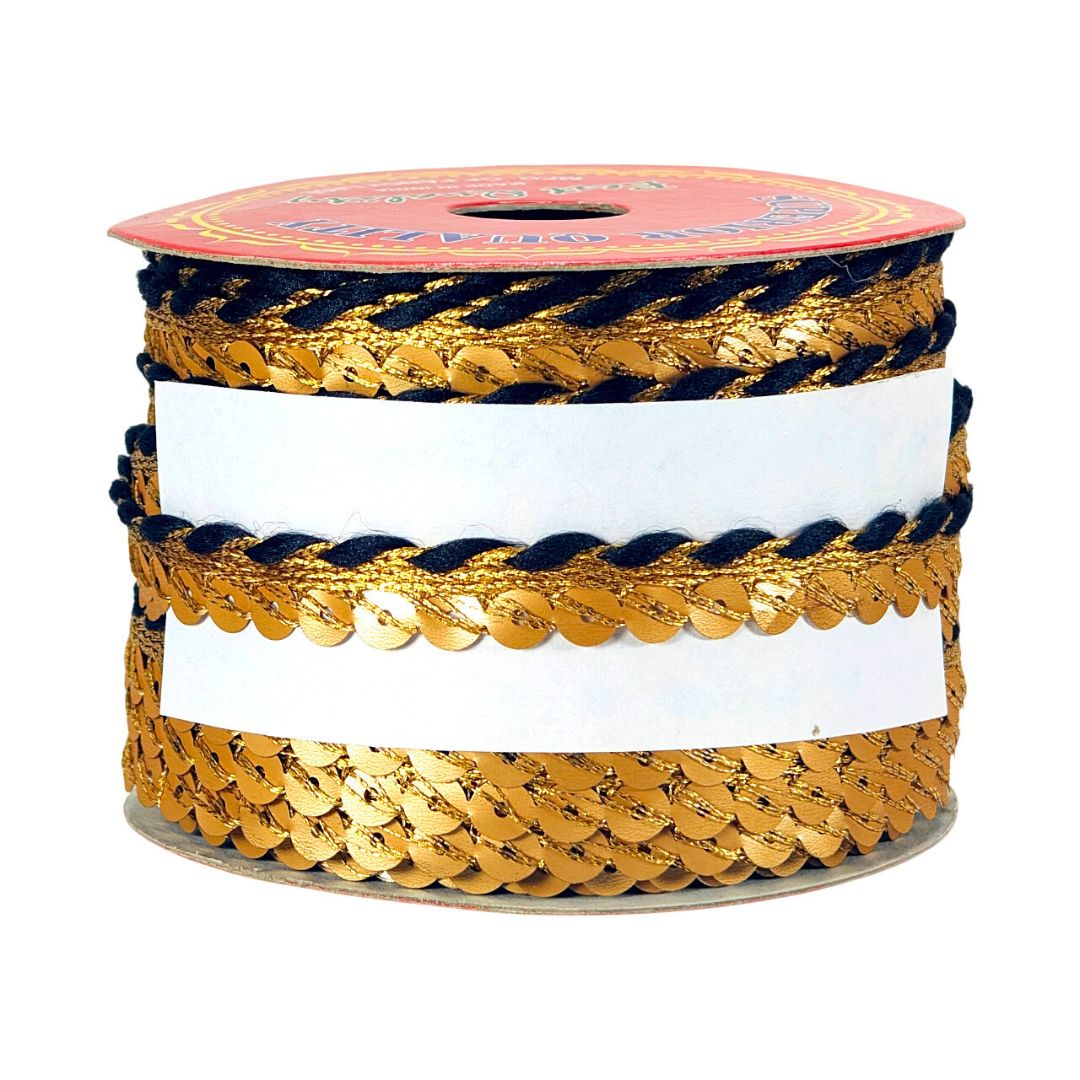 Spool of gold and navy braided ribbon on a white background