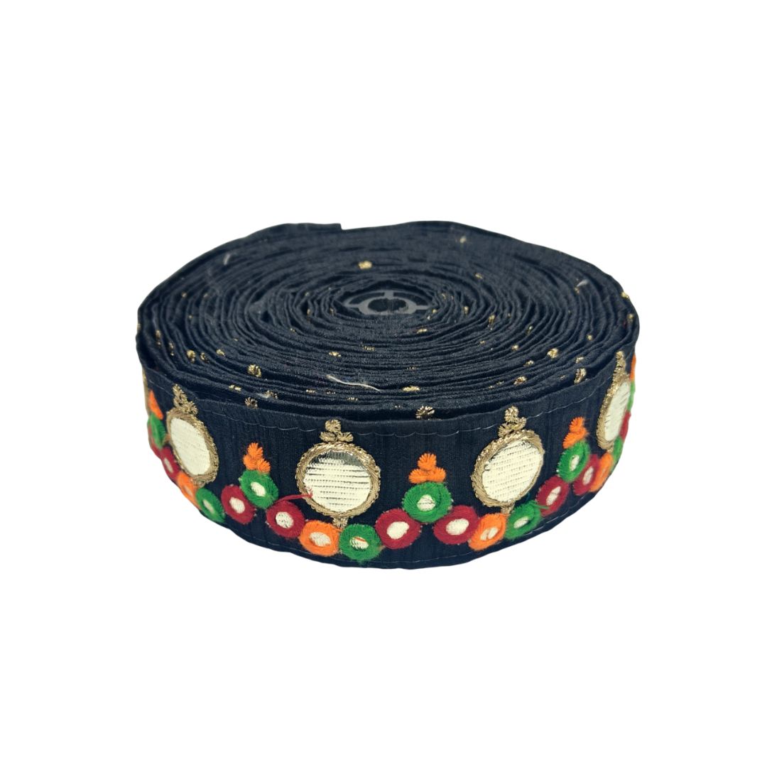 Decorative ribbon with colorful ornaments on a black background