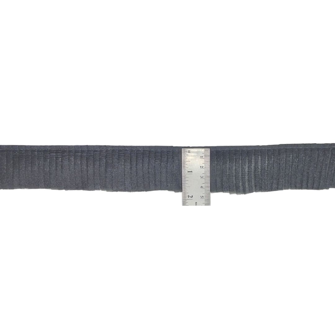 Gray ribbed knit belt with a ruler for size reference on a white background