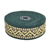 Green ribbon with gold decorative pattern on a white background