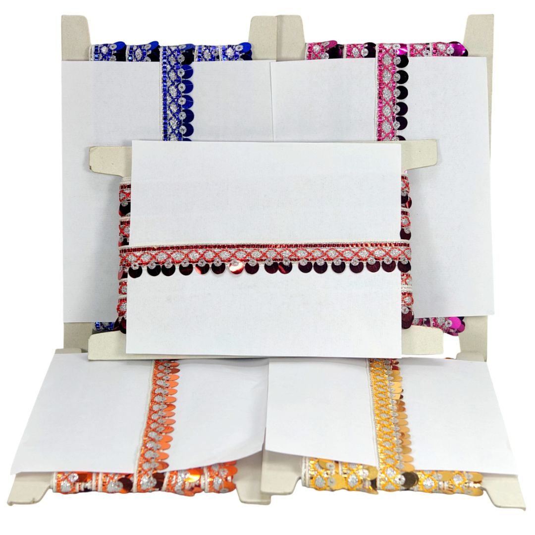 Colorful fabric samples displayed on a rack with white background