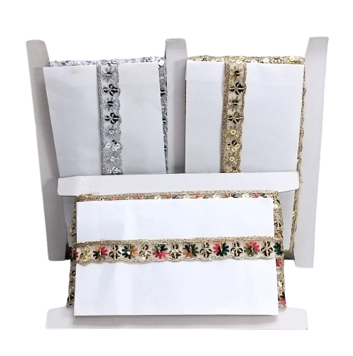 Decorative pillow with floral and geometric patterns on a white background