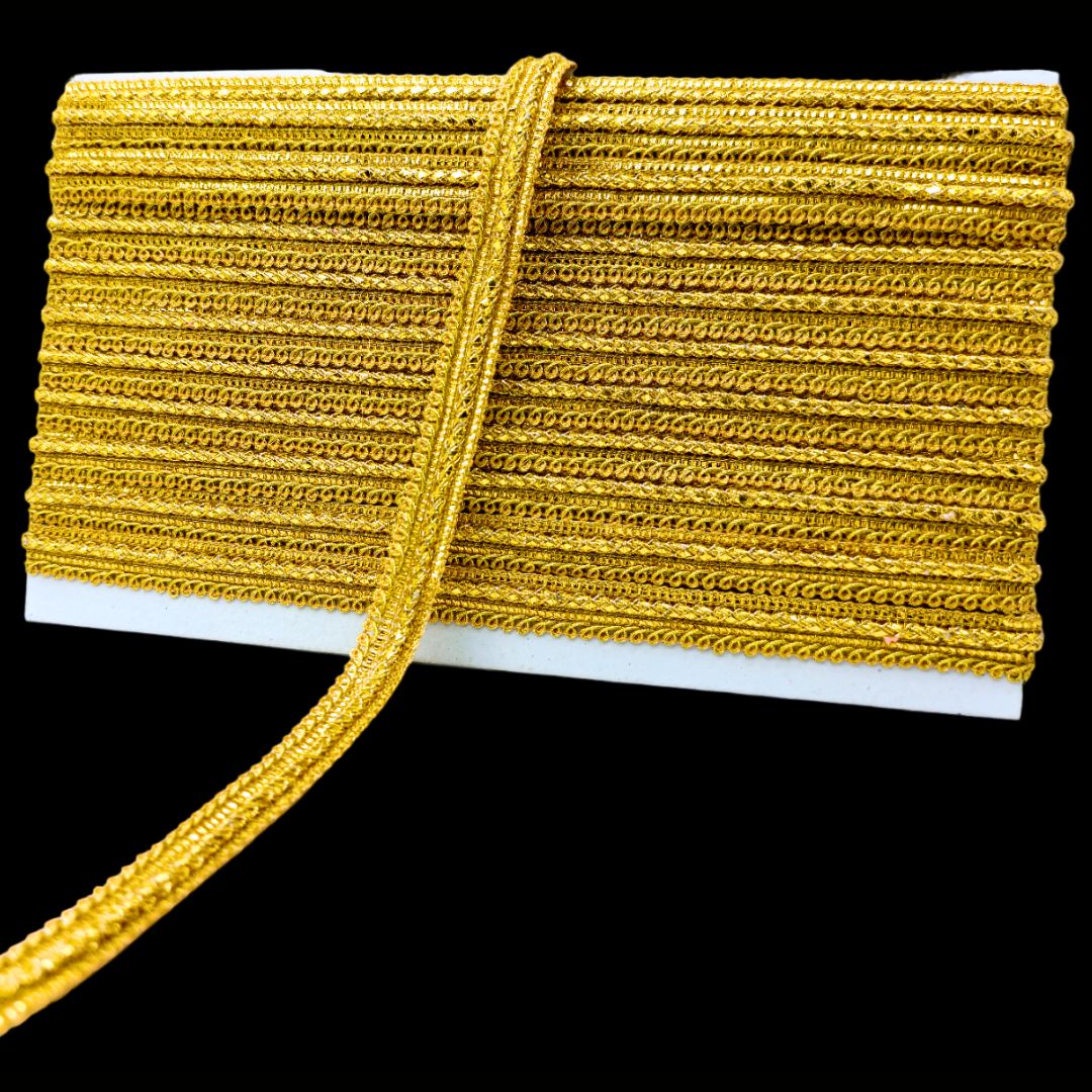 Yellow braided cord on a white background