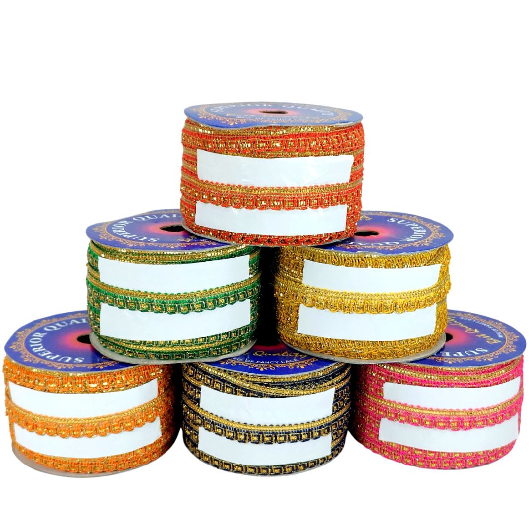 Stack of colorful ribbon spools with decorative labels on a white background
