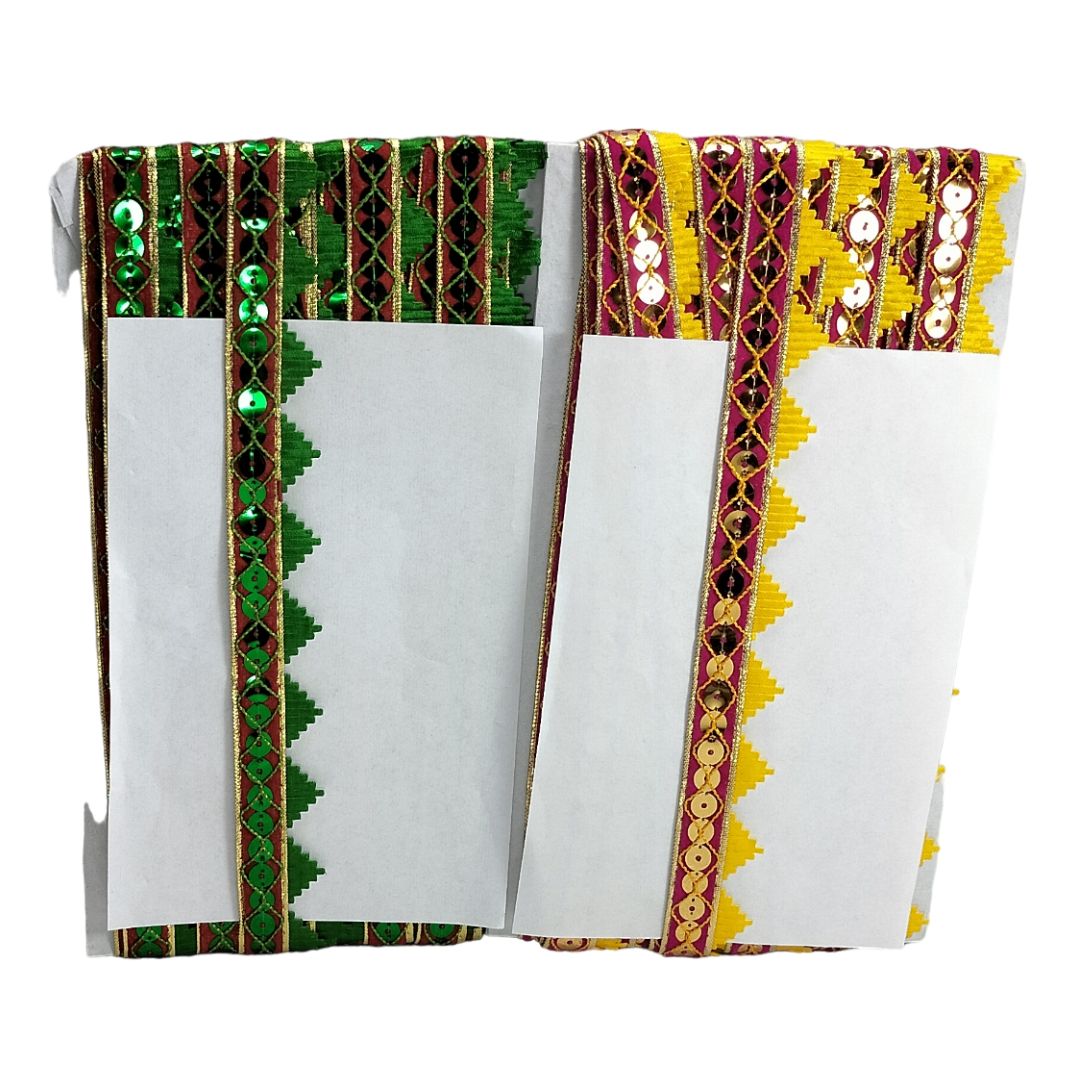 Decorative fabric with green and yellow patterns on a white background