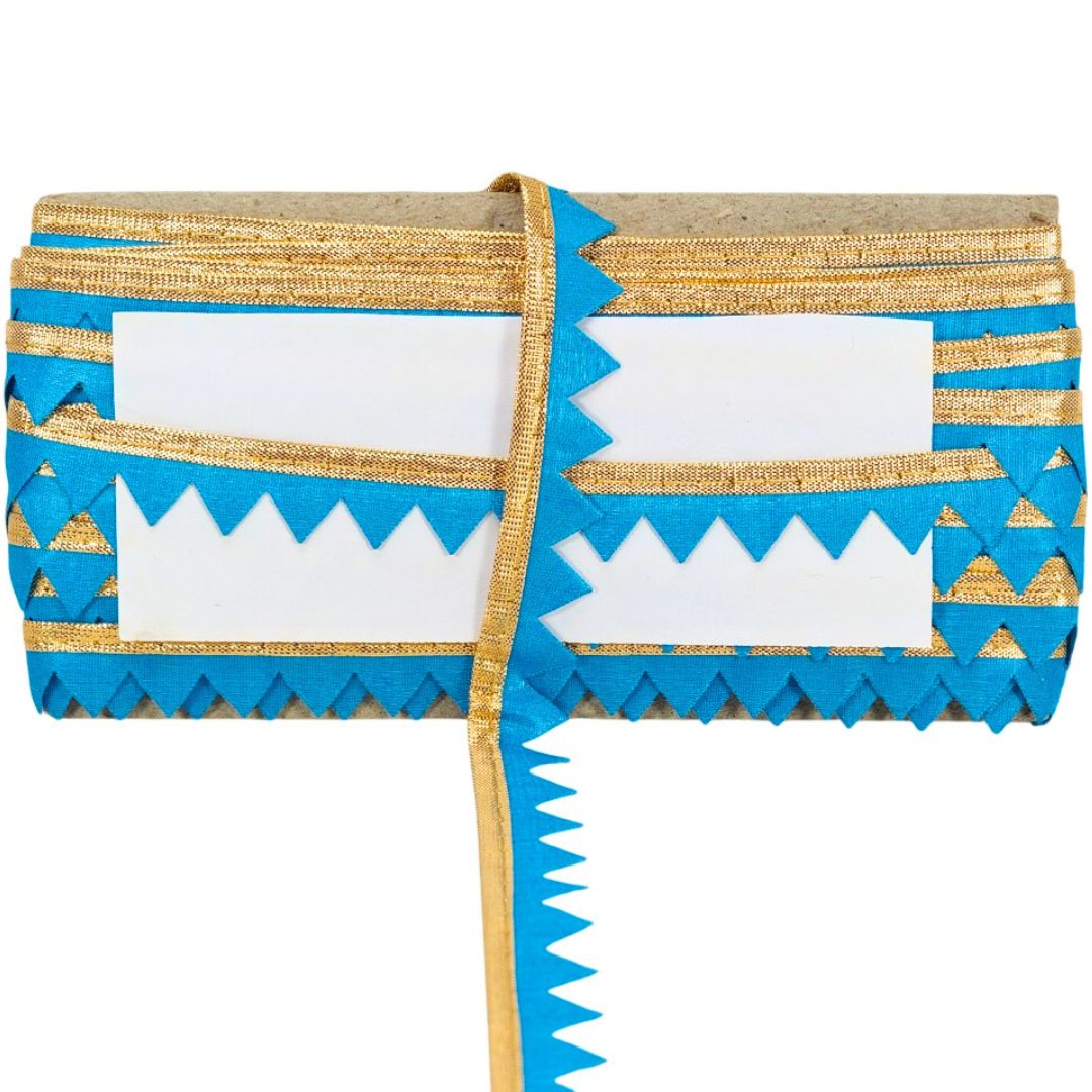 Blue and gold clutch with geometric pattern on a white background