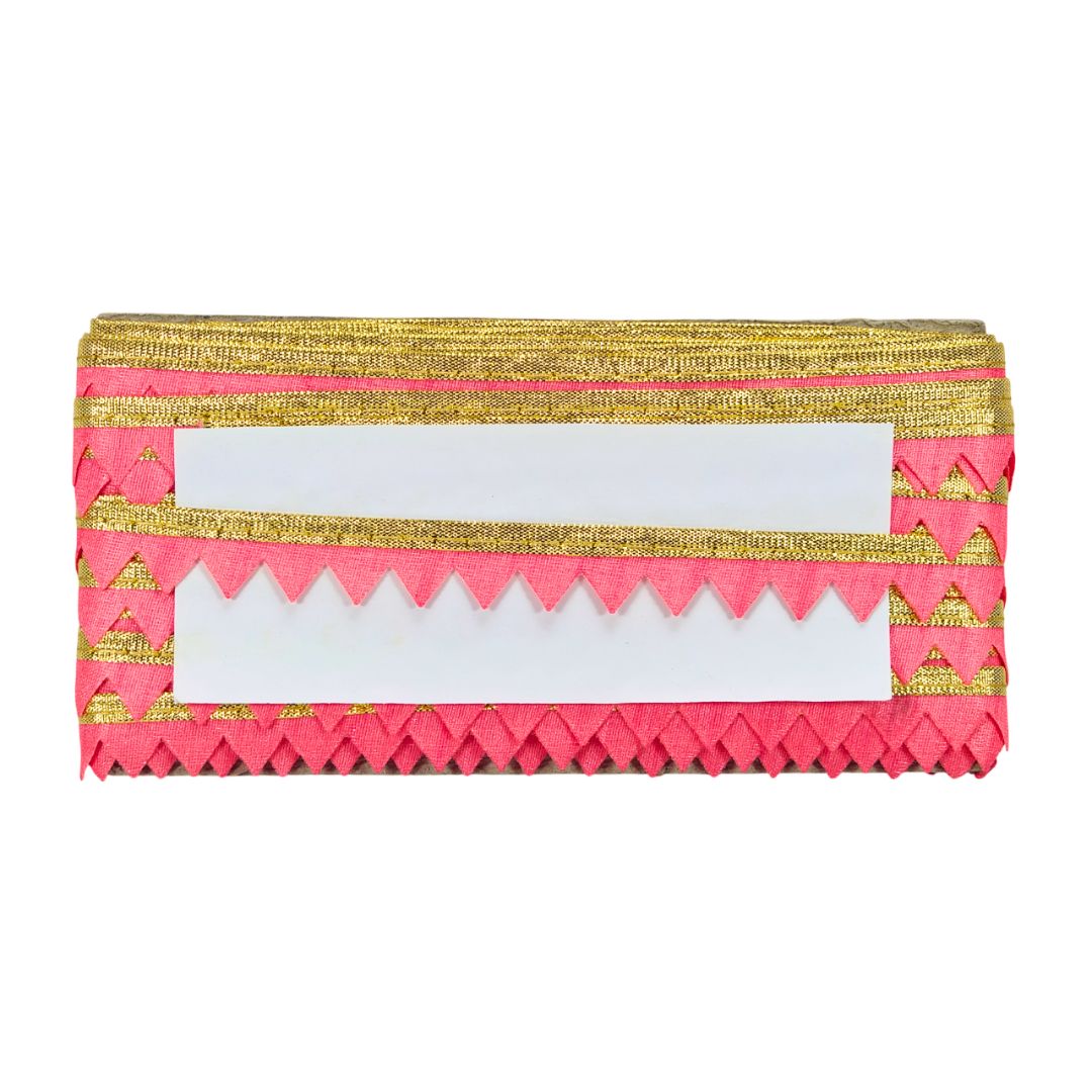 Pink and gold clutch bag on a white background