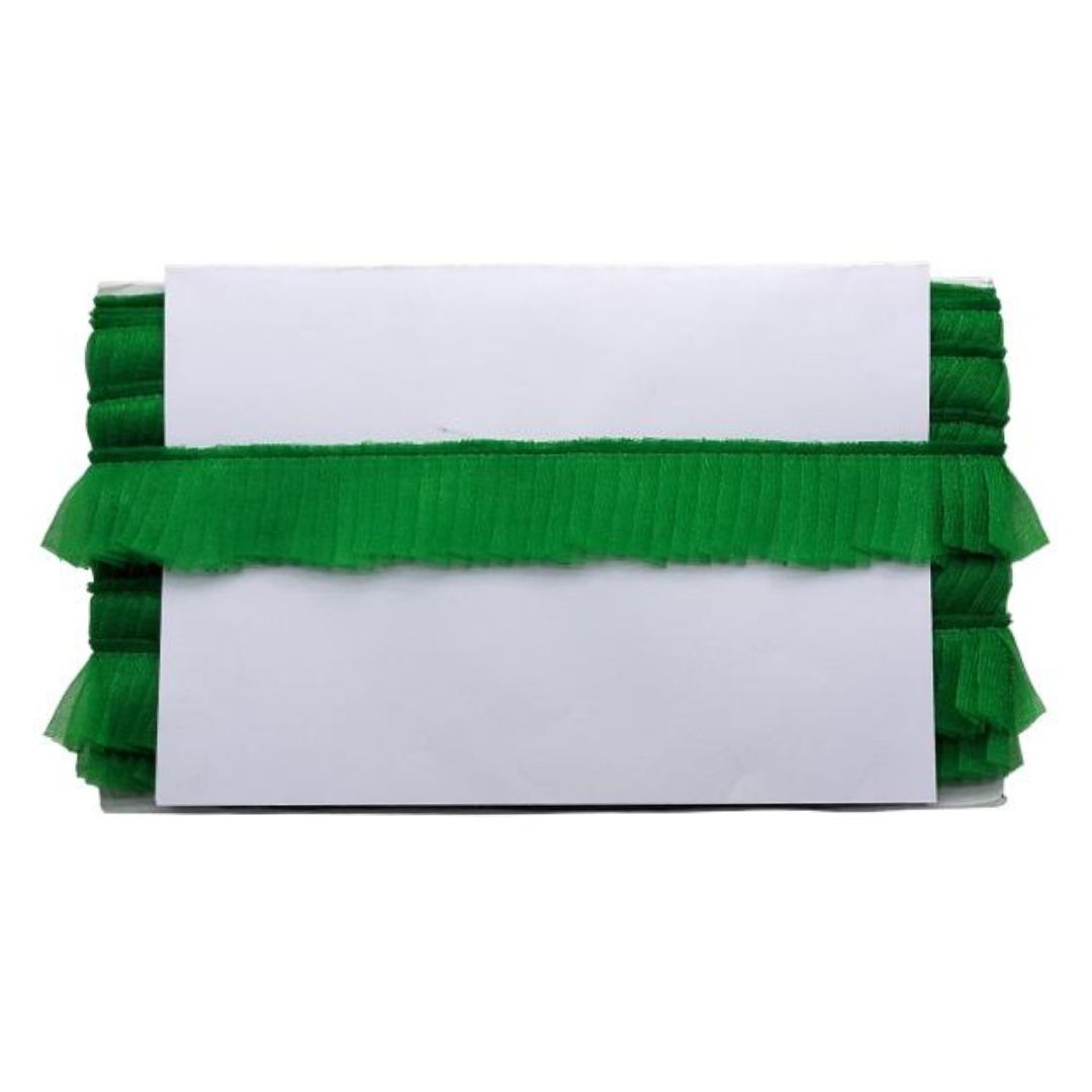 White card with green ruffled trim on a white background