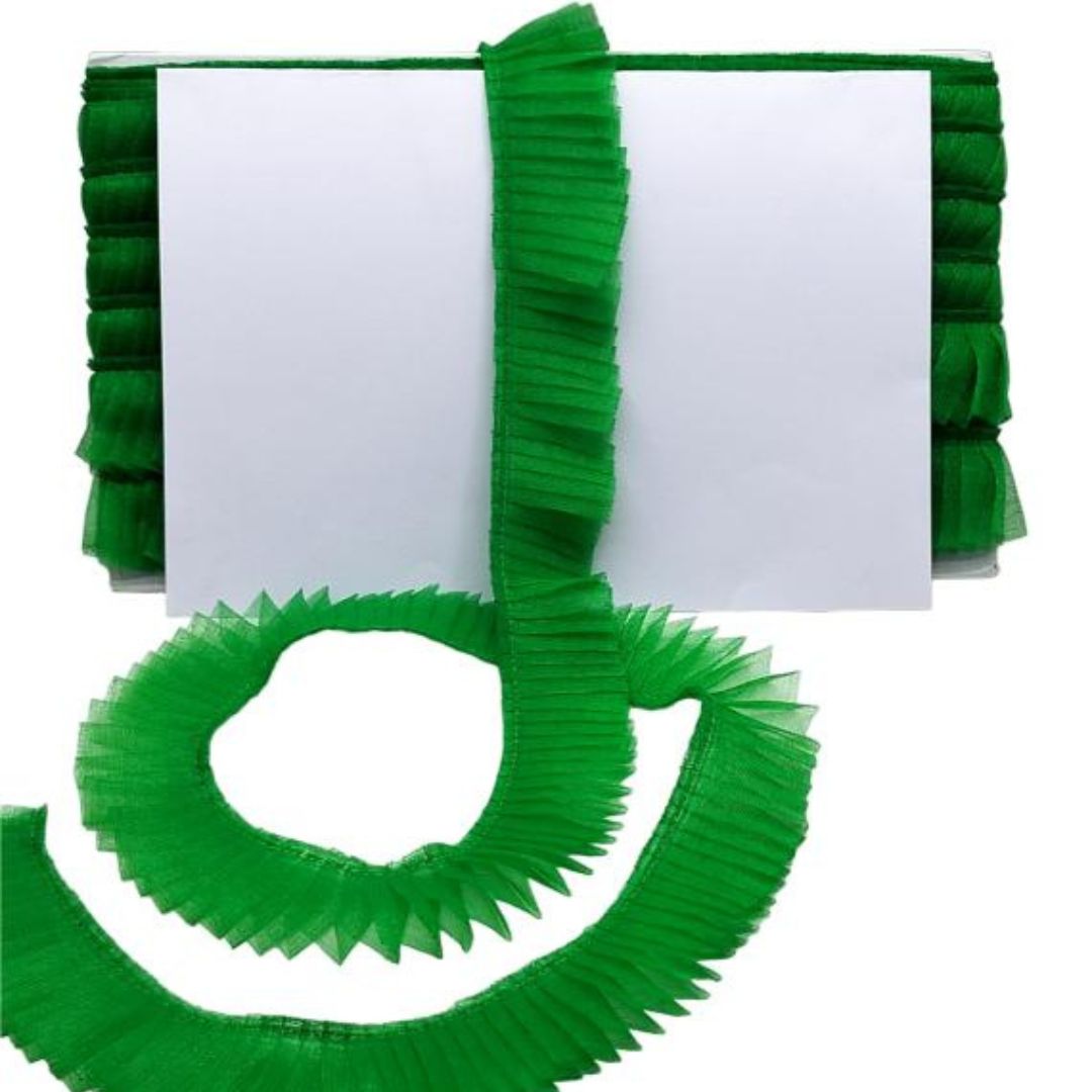 Green decorative ribbons on a white background
